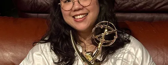 Meghan Ang holding Emmy