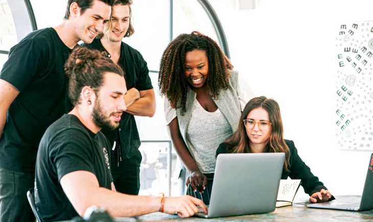 Group people looking laptop