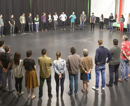 Students standing in circle